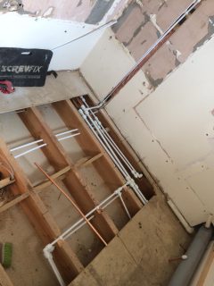 Running new pipes for bathroom refurbishment